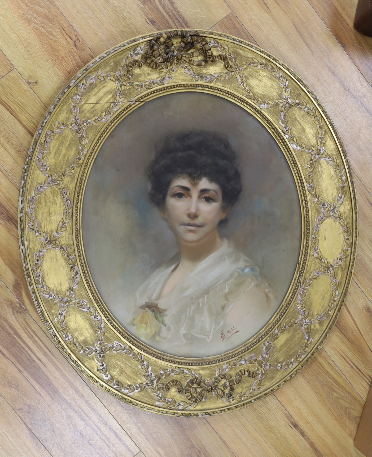 LS 1892, oil on canvas, Portrait of a lady, monogrammed and dated, framed to the oval, 60 x 50cm